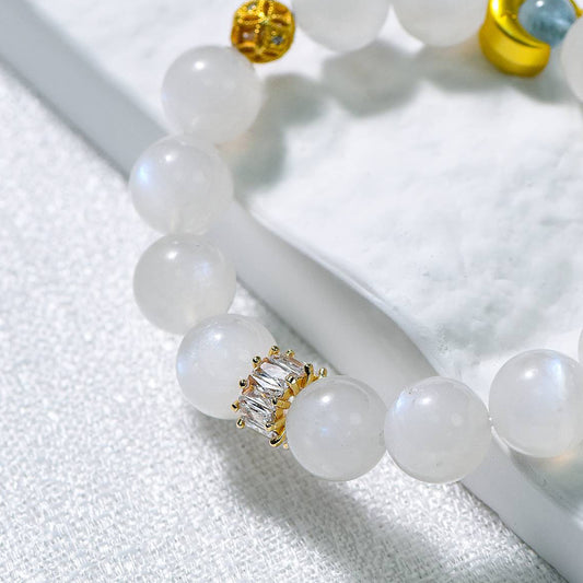 Moonstone and Aquamarine Bracelet, a harmonious combination of two crystals known for their calming and soothing energies. Crafted with care, this bracelet is designed to evoke feelings of serenity, balance, and emotional healing.