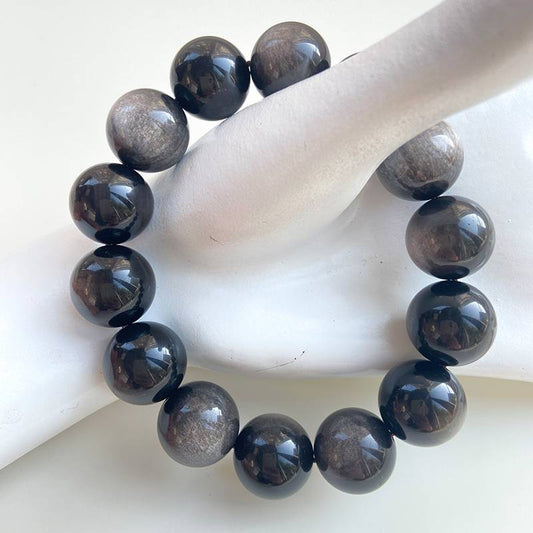 Beaded Silver Sheen Obsidian Bracelet, a sleek and mystical piece crafted from genuine Silver Sheen Obsidian beads.