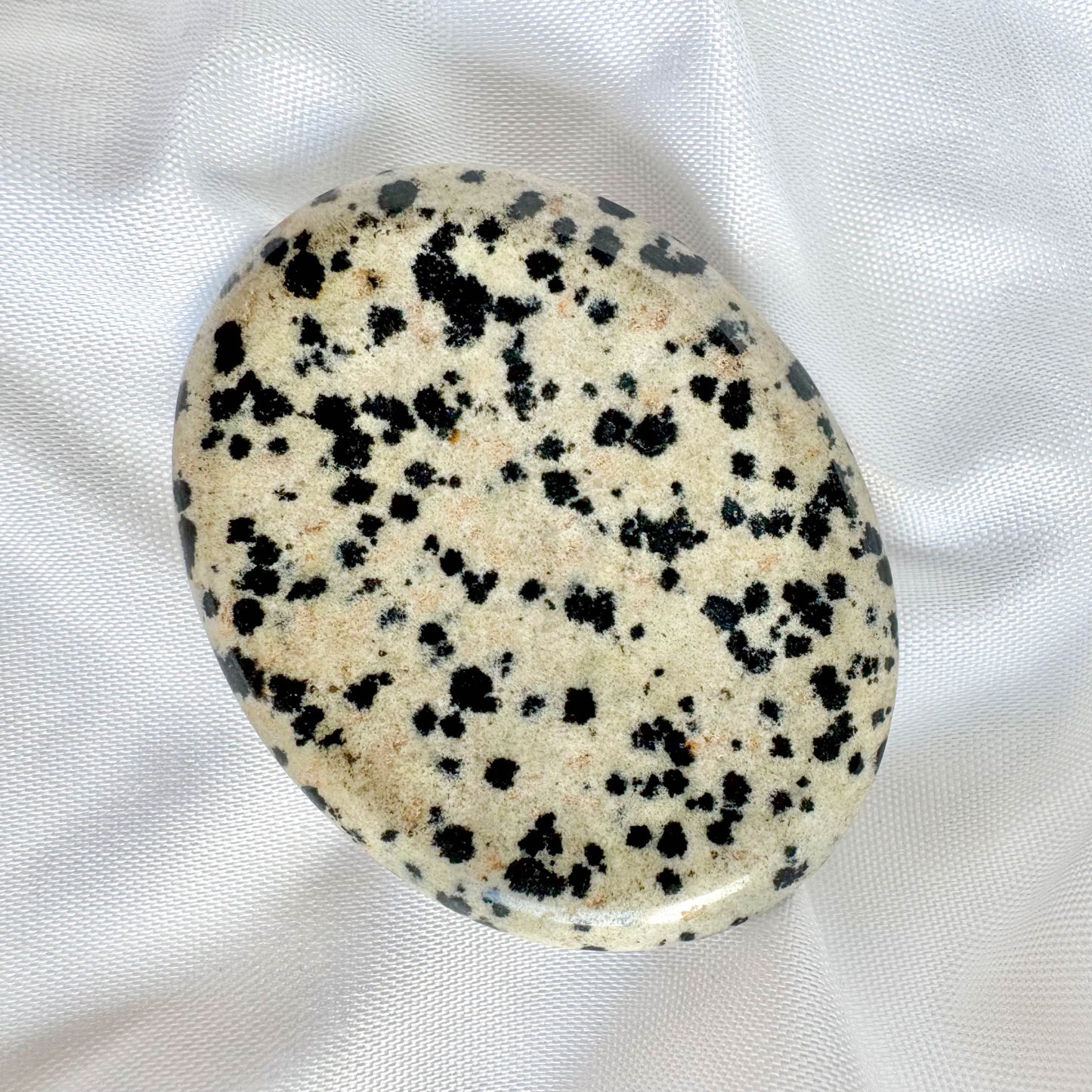 Dalmatian Jasper is known for its grounding and protective properties. It encourages a sense of playfulness and joy, while also dispelling negative energy.