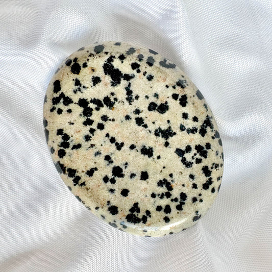Dalmatian Jasper is known for its grounding and protective properties. It encourages a sense of playfulness and joy, while also dispelling negative energy.