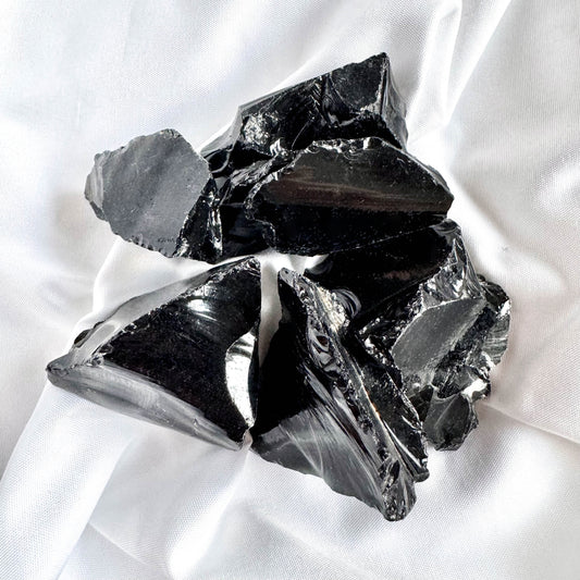 Obsidian is a powerful protective stone that shields against negativity. It also promotes emotional healing and clarity.