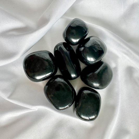 Obsidian is a powerful protective stone that shields against negativity. It also promotes emotional healing and clarity.