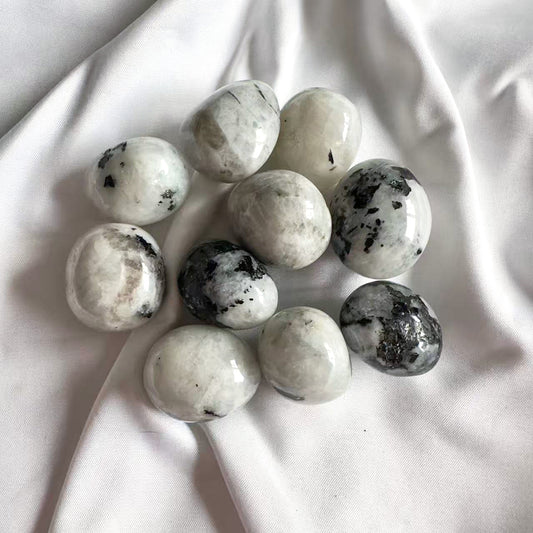 Rainbow Moonstone Tumble Stone is a mystical crystal connected to intuition, feminine energy, and emotional harmony.