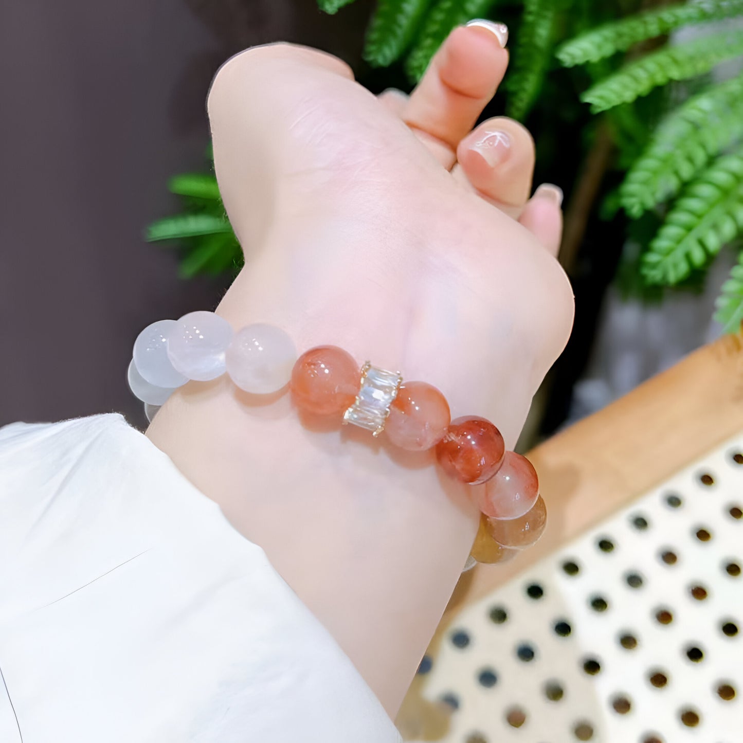 Rabbit Hair Rutilated Quartz Bracelet, a stunning accessory crafted with the unique and mesmerizing Rabbit Hair Rutilated Quartz. This bracelet combines the beauty of rutilated quartz with the elegance of rabbit hair inclusions, creating a one-of-a-kind piece that radiates positive energy and sophistication.