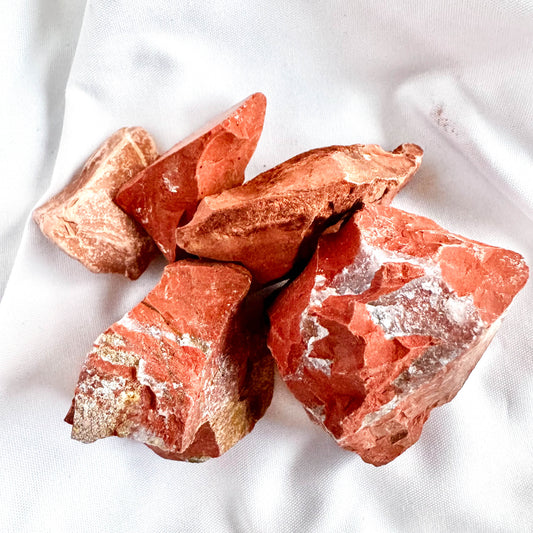 Red Jasper is known for its grounding and stabilizing properties. It brings strength, courage, and emotional balance.