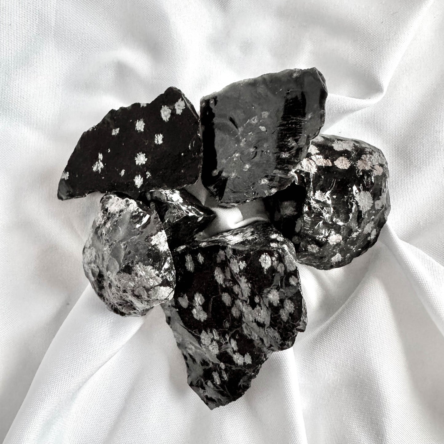 Snowflake Obsidian brings balance to the mind, body, and spirit. It helps in recognizing and releasing negative thoughts and patterns.
