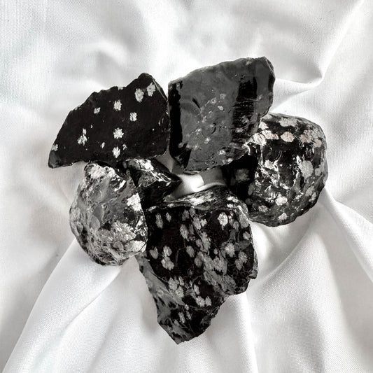 Snowflake Obsidian brings balance to the mind, body, and spirit. It helps in recognizing and releasing negative thoughts and patterns.