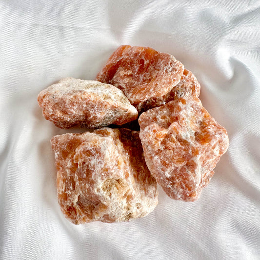 Sunstone brings joy, optimism, and enthusiasm. It clears negative energy and promotes self-empowerment.