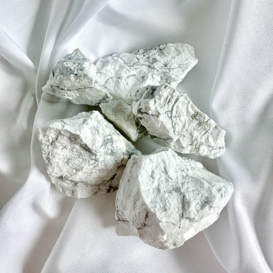 White Buffalo Turquoise is a rare and powerful stone known for its protective and calming properties.