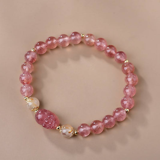 Strawberry Quartz is a rare variety of quartz known for its delicate pink hues and loving vibrations.
